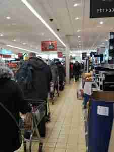 Shoppers queue at Aldi in Roscommon last Thursday as panic buying took hold following the outbreak of Covid-19.